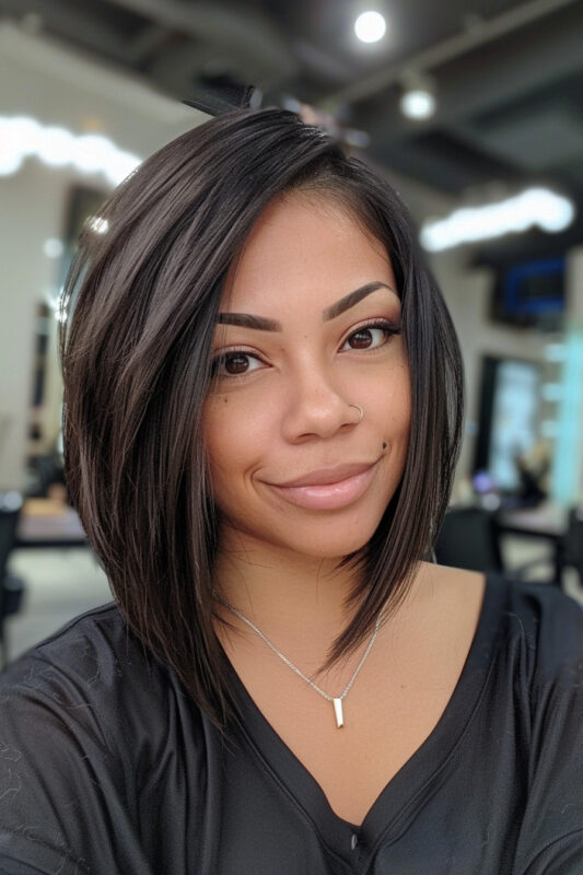 A woman with a dark brown layered bob.