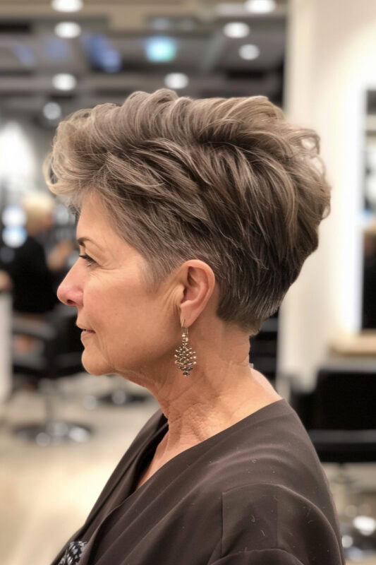 Woman with a textured pixie cut.