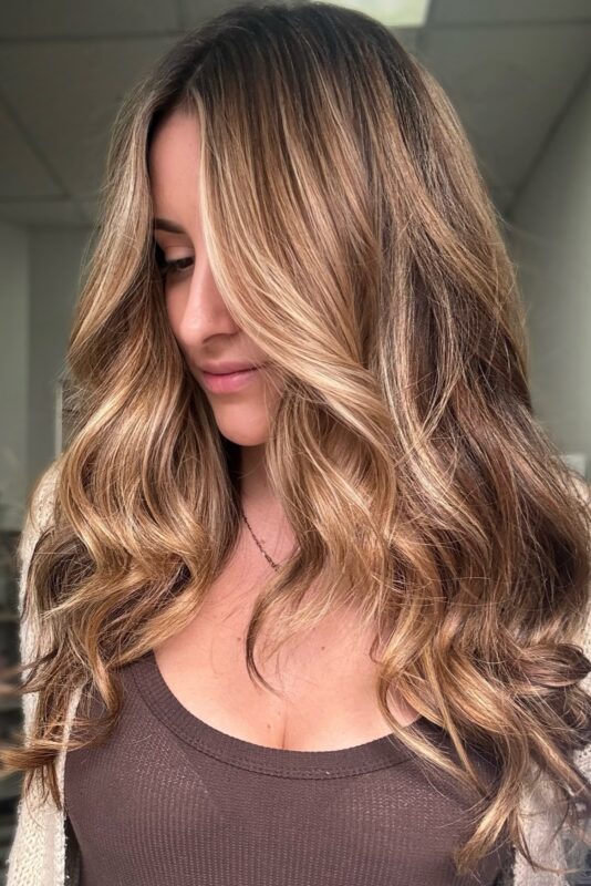 Woman with caramel bronde hair.