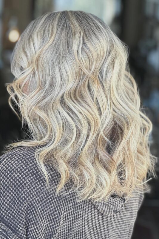 Multitonal blonde highlights artfully covering gray in blonde hair.