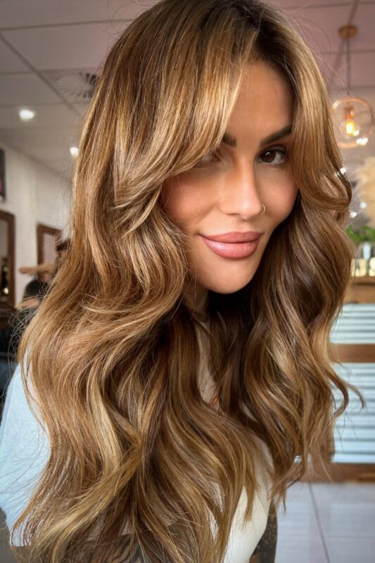 Woman with golden bronde hair.