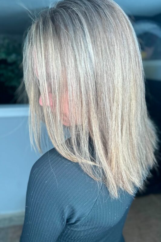 An elegant style with grey blending with platinum blonde highlights.