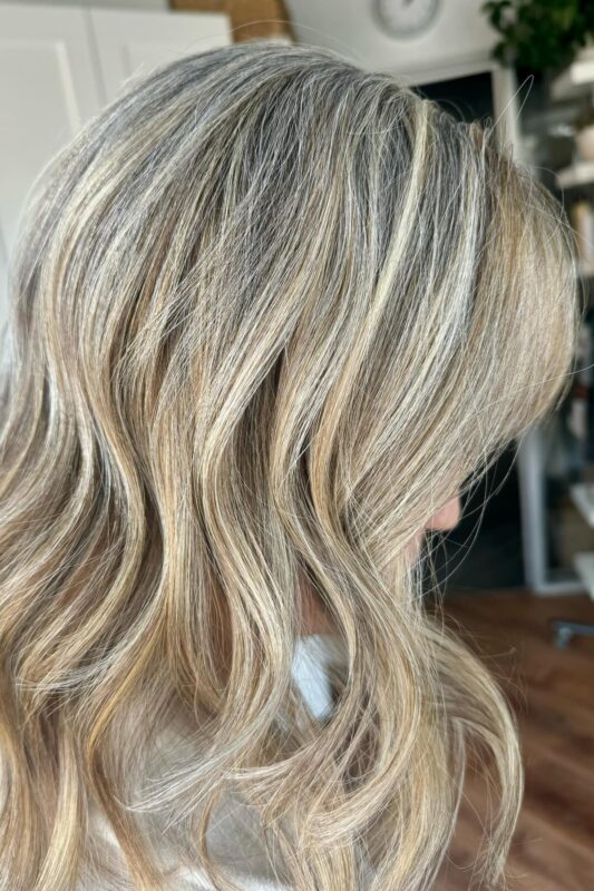 Vanilla blonde gray blending highlights for a warm, low-maintenance look.