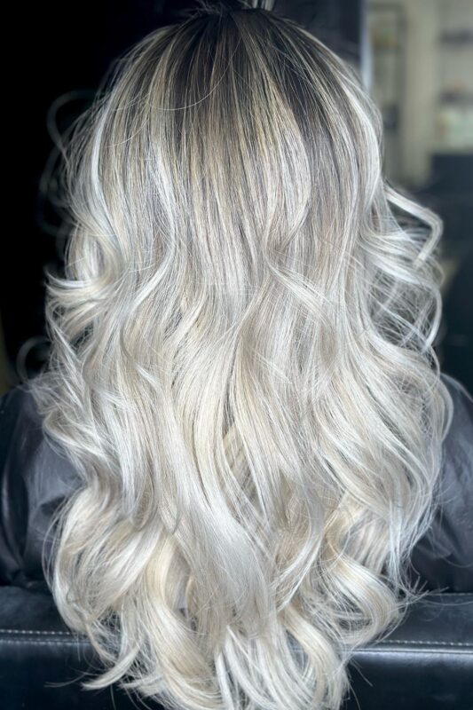 Woman with ice blonde highlights.