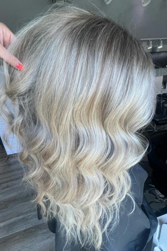 Woman with light blonde hair balayage.