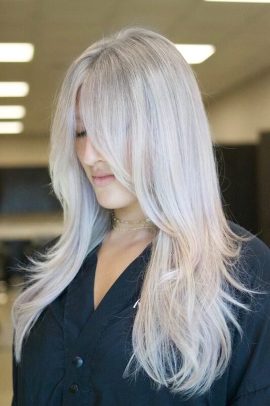 Woman with silver blonde hair.