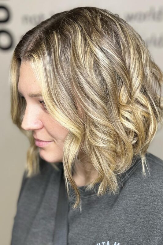 Woman with an A-line bob for thin hair.