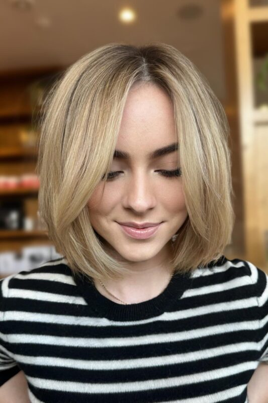 Woman with a classic bob haircut designed for fine hair.