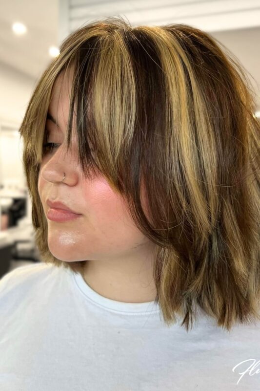 Woman with a bob haircut featuring layers for thin hair.