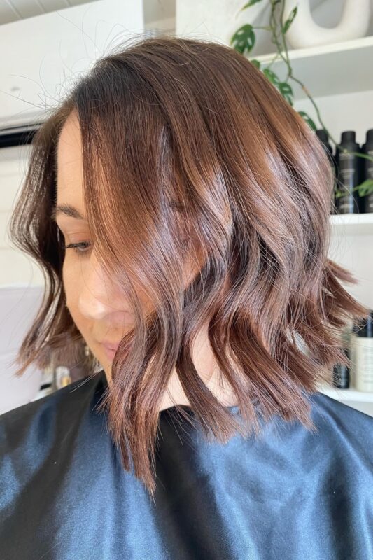 Woman with a chin-length Italian bob haircut.