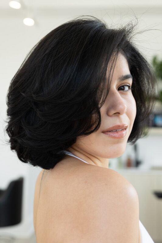 Woman with a chin-length plush bob haircut.