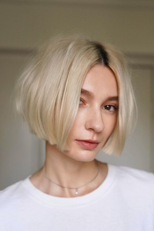 Woman with a chin-length soft blunt bob haircut.