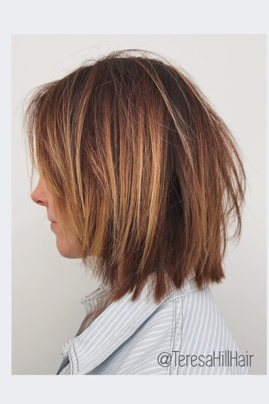 Woman with a choppy bob perfect for fine hair.