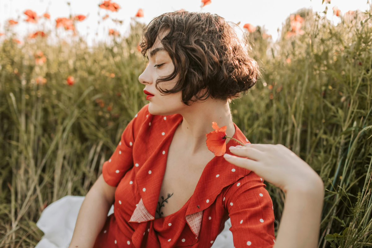 Woman with a classic French bob haircut.