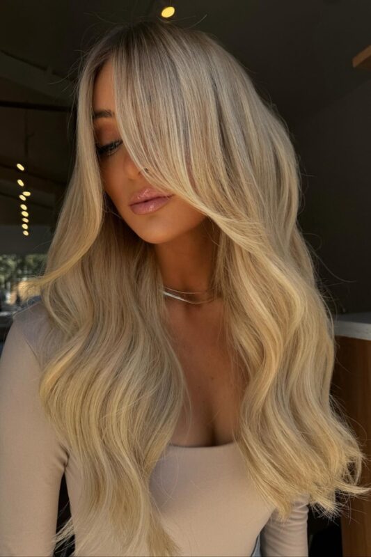 Woman with a honey blonde hair color.