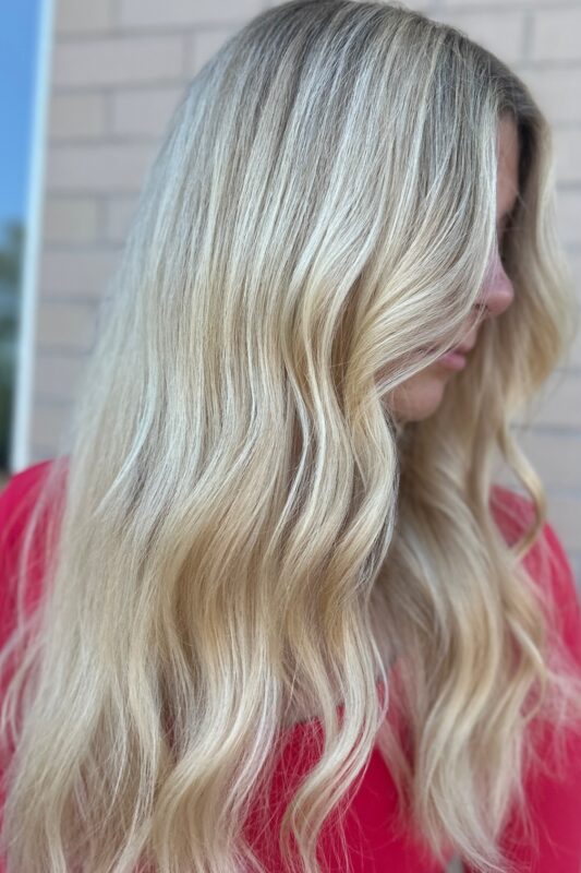 Woman with a light dirty blonde hair color.