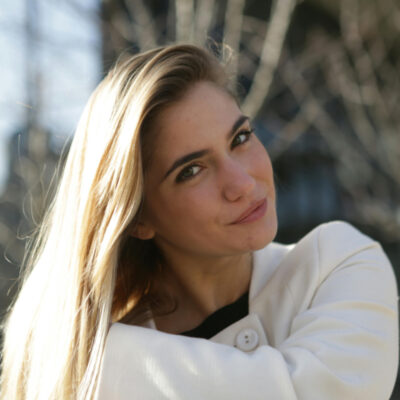 Woman with a warm golden brown hair color.