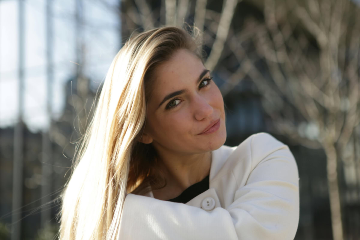 Woman with a warm golden brown hair color.